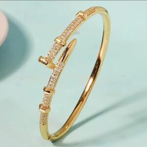 Juste Un Clou Elegant Gold Bangle Bracelet with Crystal Accents